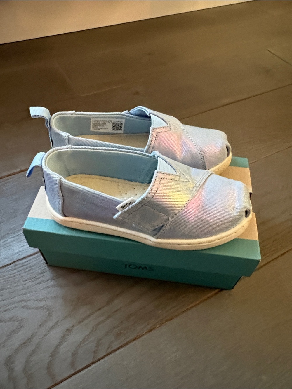 Toms Kids Slip-On Sneakers in Light Blue with Iridescent Pink Sheen